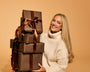 Peta Jane Murgatroyd holding self tanning gifts 