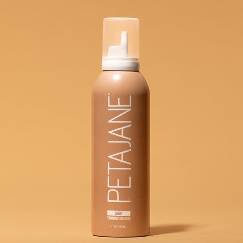 Self tanning mousse light shade by beauty Jane beauty on tan background