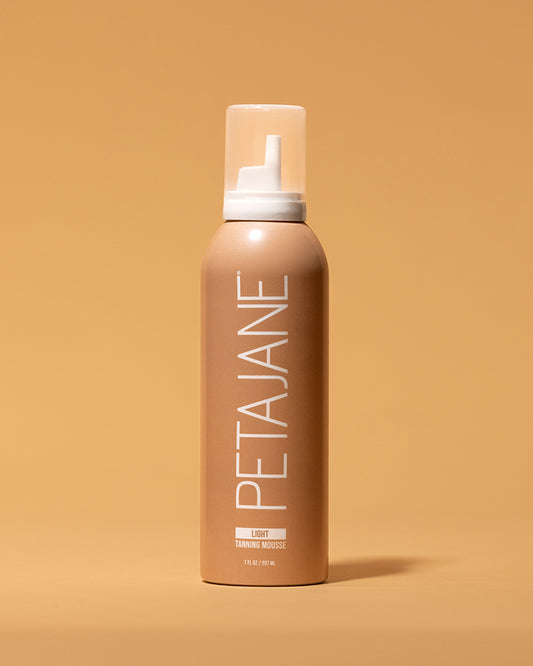 Self tanning mousse light shade by beauty Jane beauty on tan background
